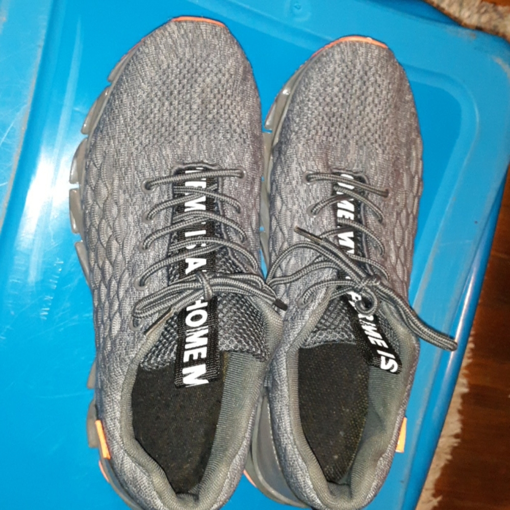Orange and gray brand new running shoes